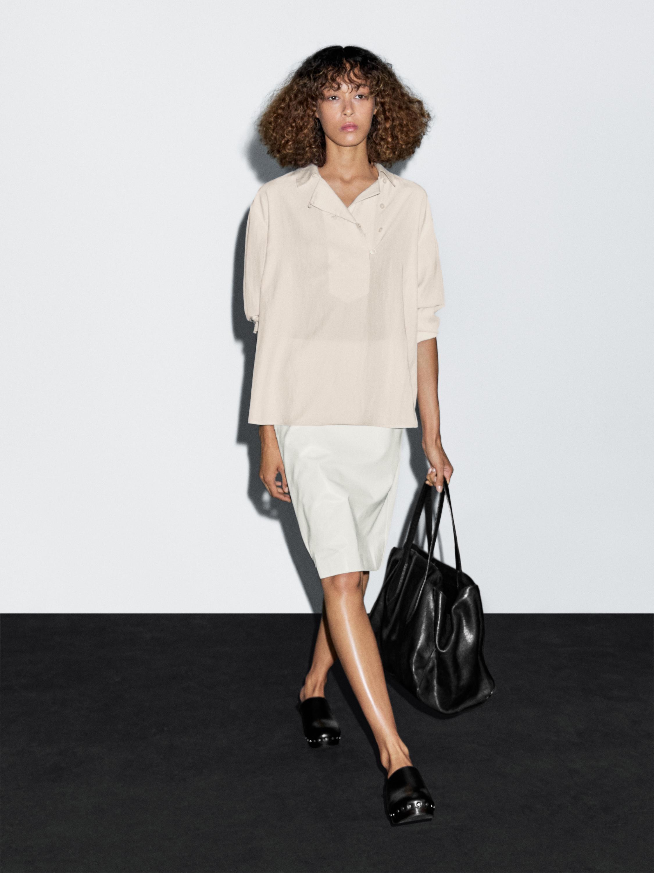 Flowing blouse with button detail